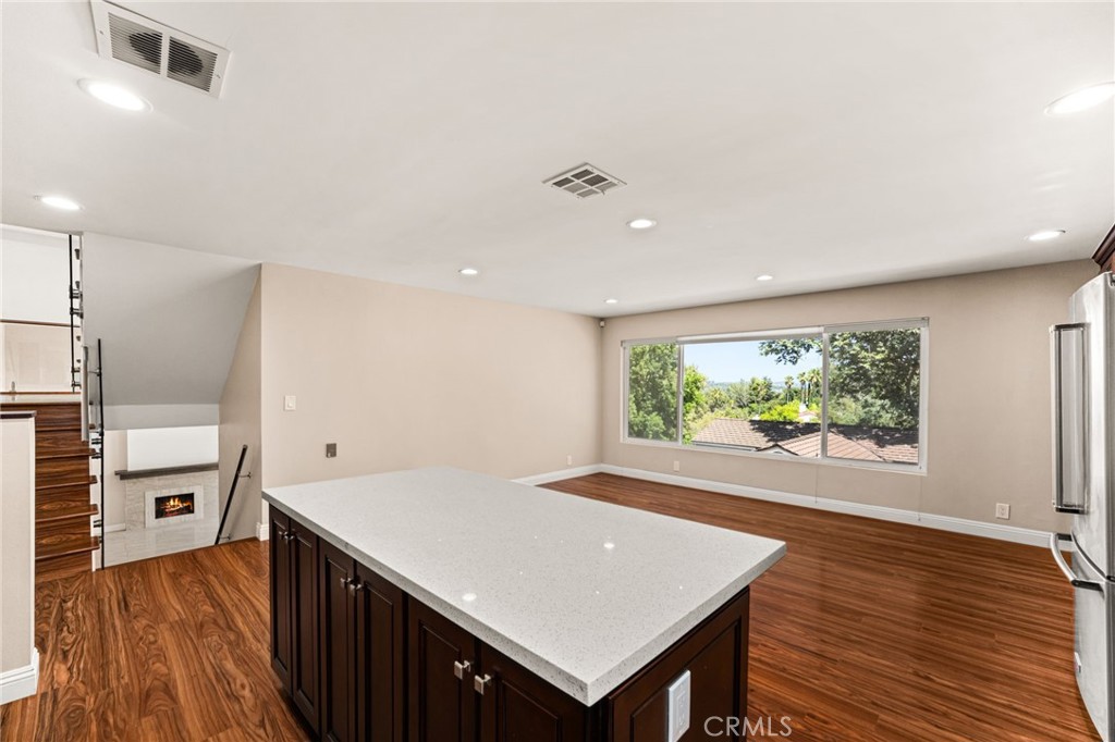 3751 Prestwick Drive Los Angeles, CA 90027 - Photo 16 of 50 a view of kitchen with stainless steel appliances cabinets and wooden floor