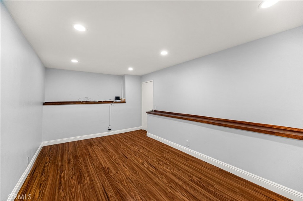 3751 Prestwick Drive Los Angeles, CA 90027 - Photo 19 of 50 a view of a room with wooden floor