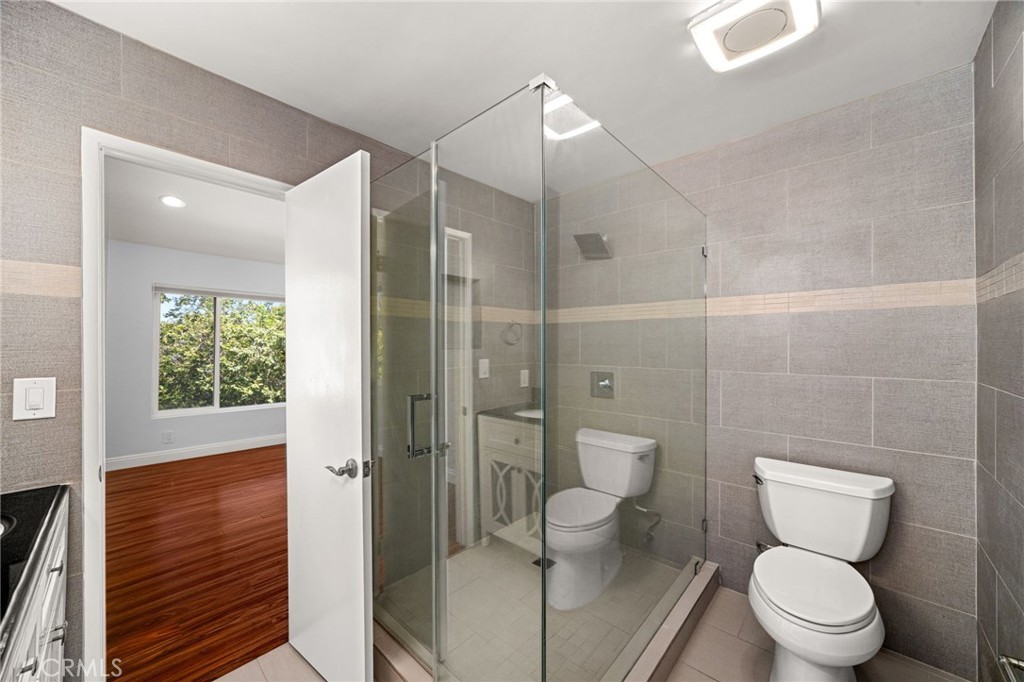 3751 Prestwick Drive Los Angeles, CA 90027 - Photo 29 of 50 a bathroom with a toilet and a shower