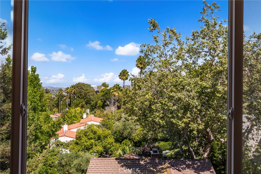 3751 Prestwick Drive Los Angeles, CA 90027 - Photo 31 of 50 a view of a garden with a tree