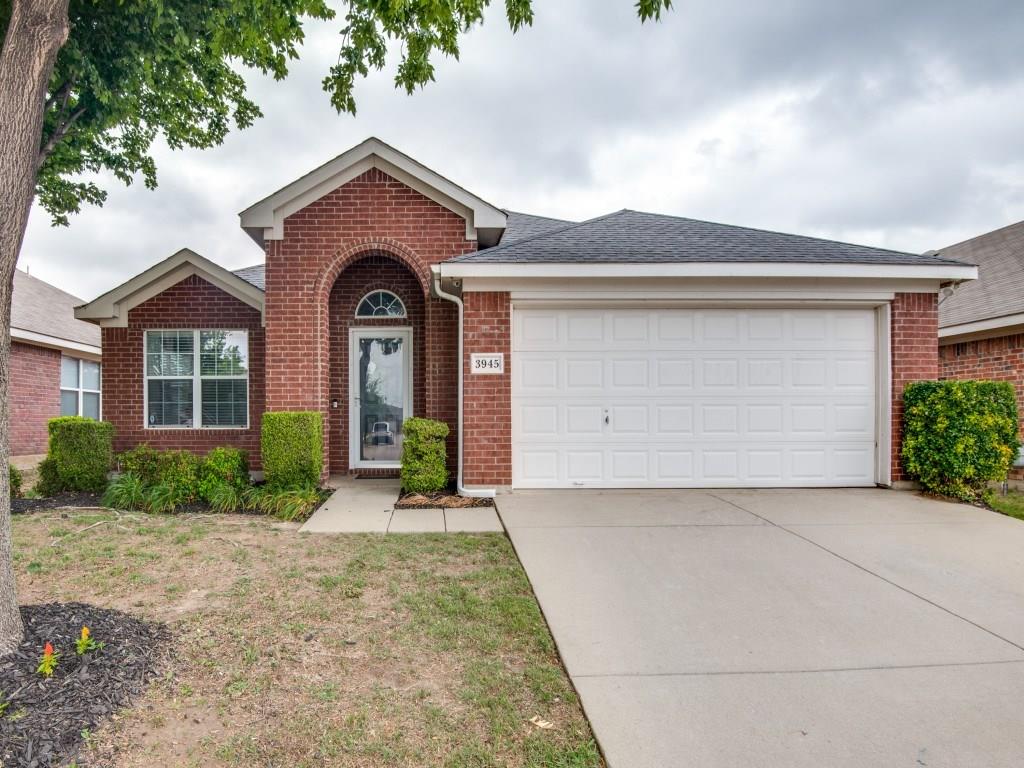3945 Shiver Road Fort Worth, TX 76244 - Photo 1 of 1 a front view of a house with a yard and garage