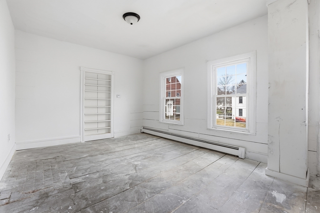 4 Townsend Street Pepperell, MA 01463 - Photo 15 of 27 an empty room with windows