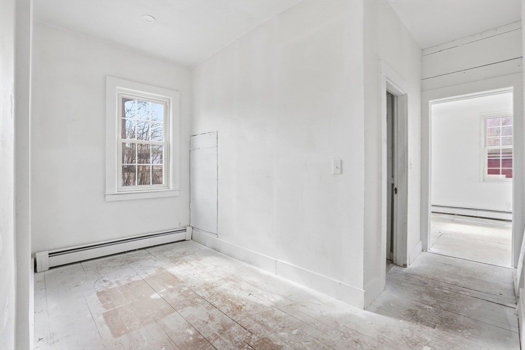 4 Townsend Street Pepperell, MA 01463 - Photo 21 of 27 a view of an empty room with a window