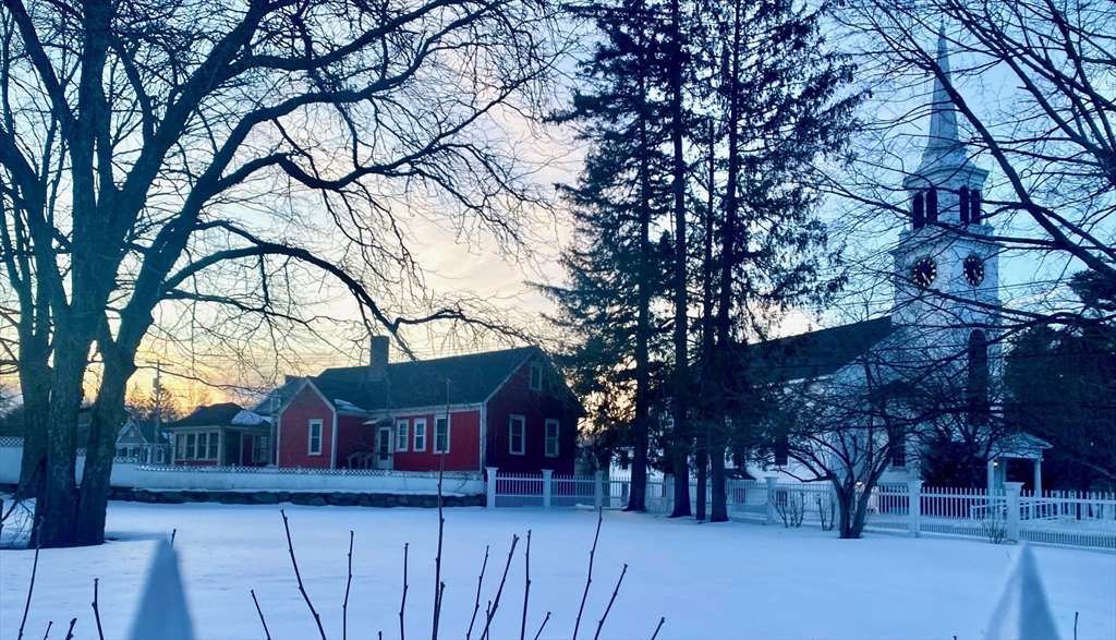 4 Townsend Street Pepperell, MA 01463 - Photo 8 of 27 a wooden house with trees in front of it