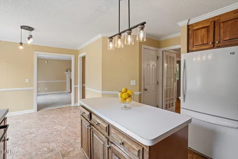 a bathroom with a sink a vanity and a shower