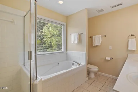 a bathroom with a bathtub toilet and sink