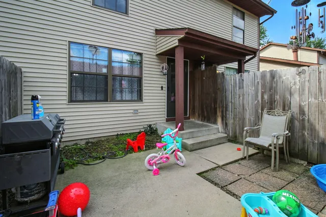 a backyard of a house with seating space