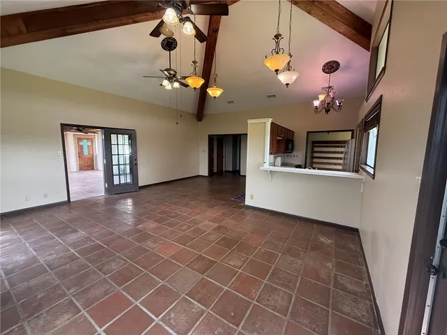 a kitchen with stainless steel appliances granite countertop microwave stove a sink dishwasher and microwave