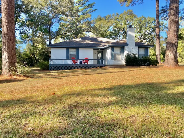 a view of a house with a ocean view