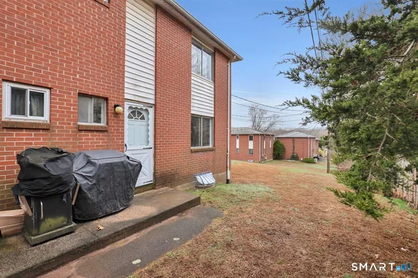 a view of a house with a patio