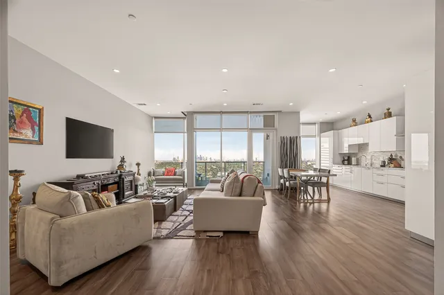 a living room with furniture and a table