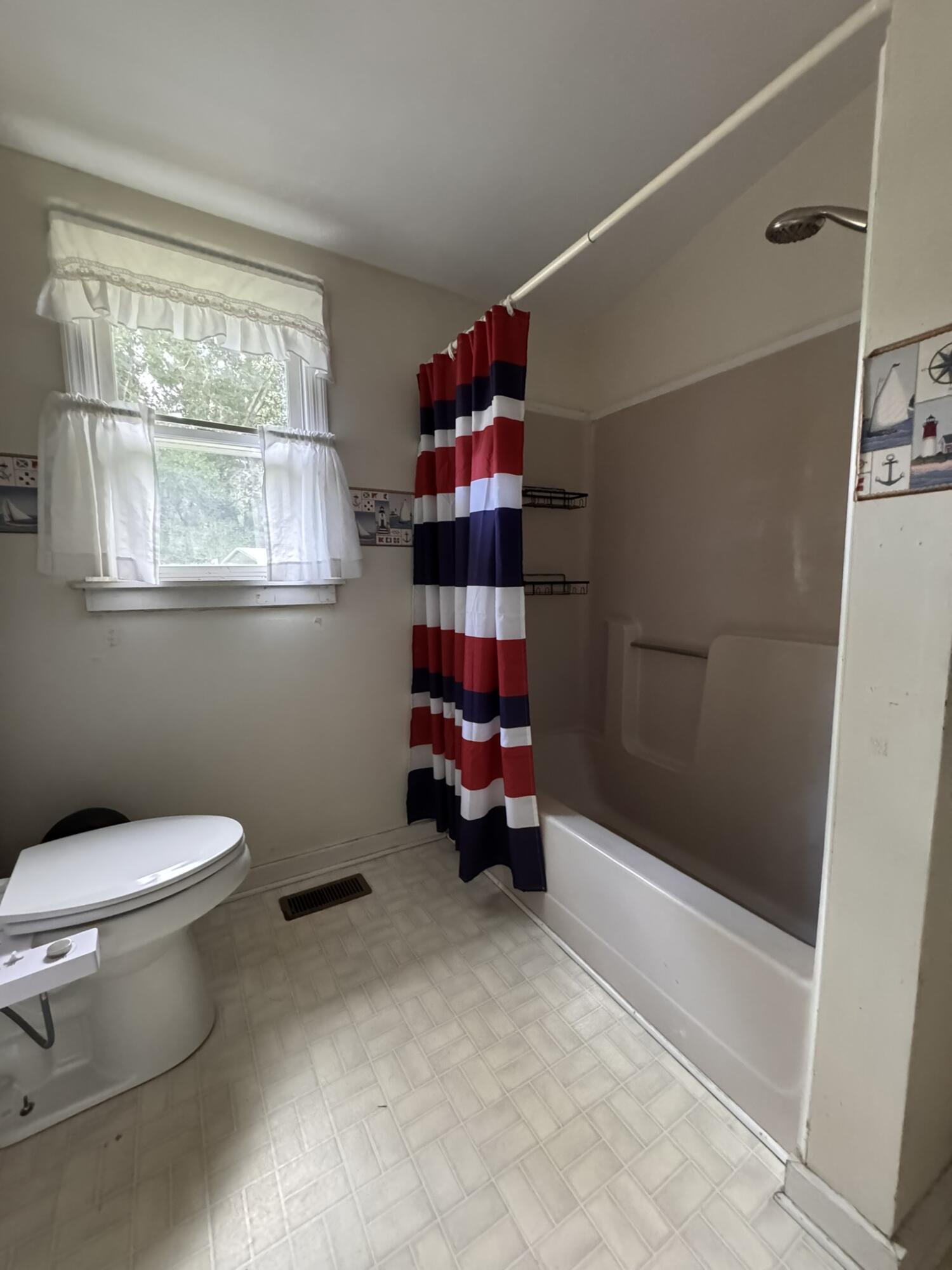 532 Pinckney Street McClellanville, SC 29458 - Photo 22 of 35 Downstairs Hall Bath
