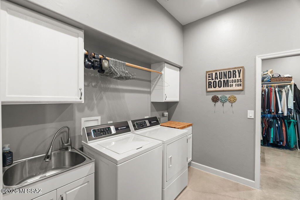 16276 East Empire View Road Vail, AZ 85641 - Photo 30 of 51 a utility room with dryer and washer