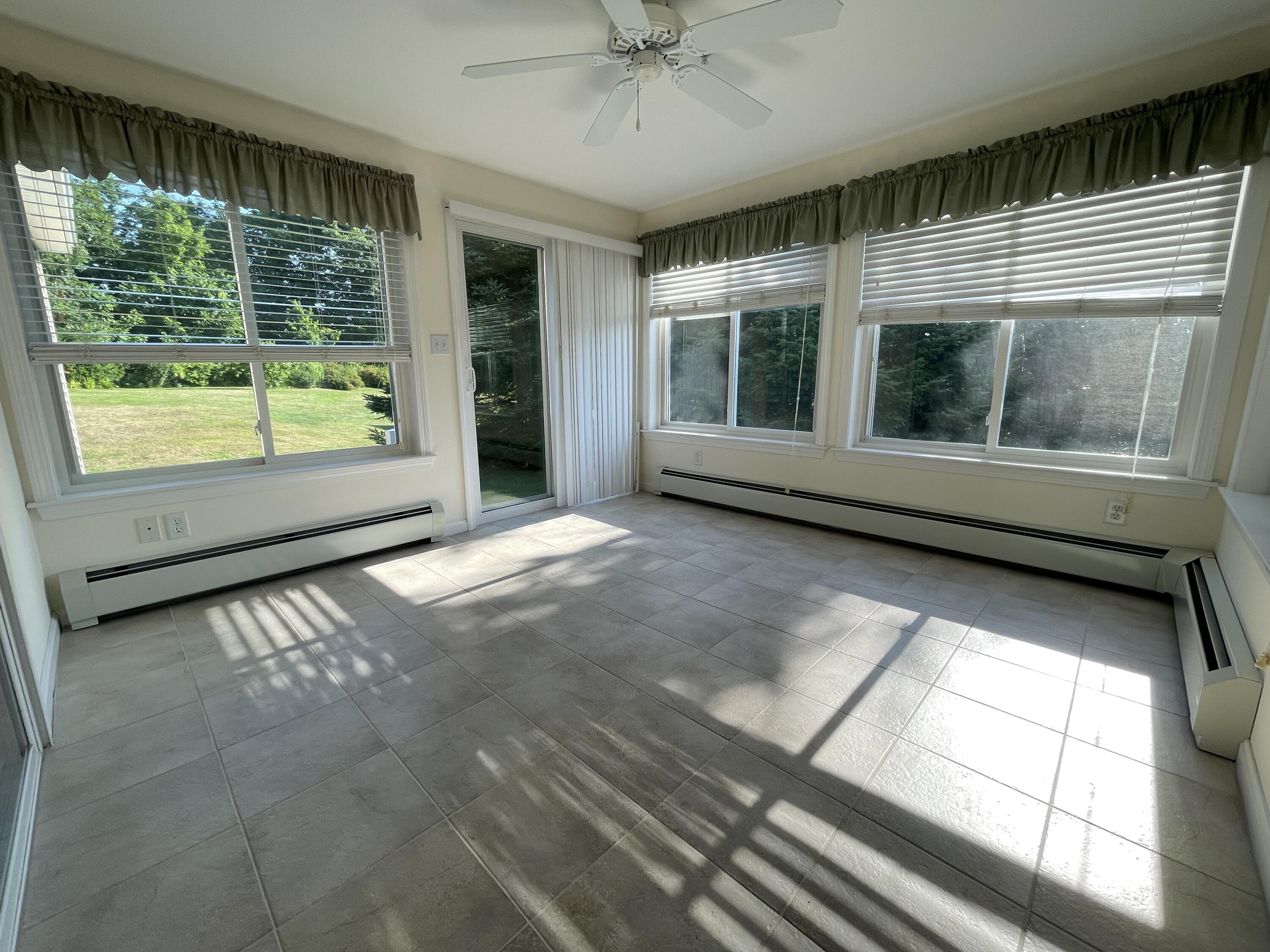 20 Ridgefield Drive, Unit 16 Gorham, ME 04038 - Photo 9 of 27 Sunroom