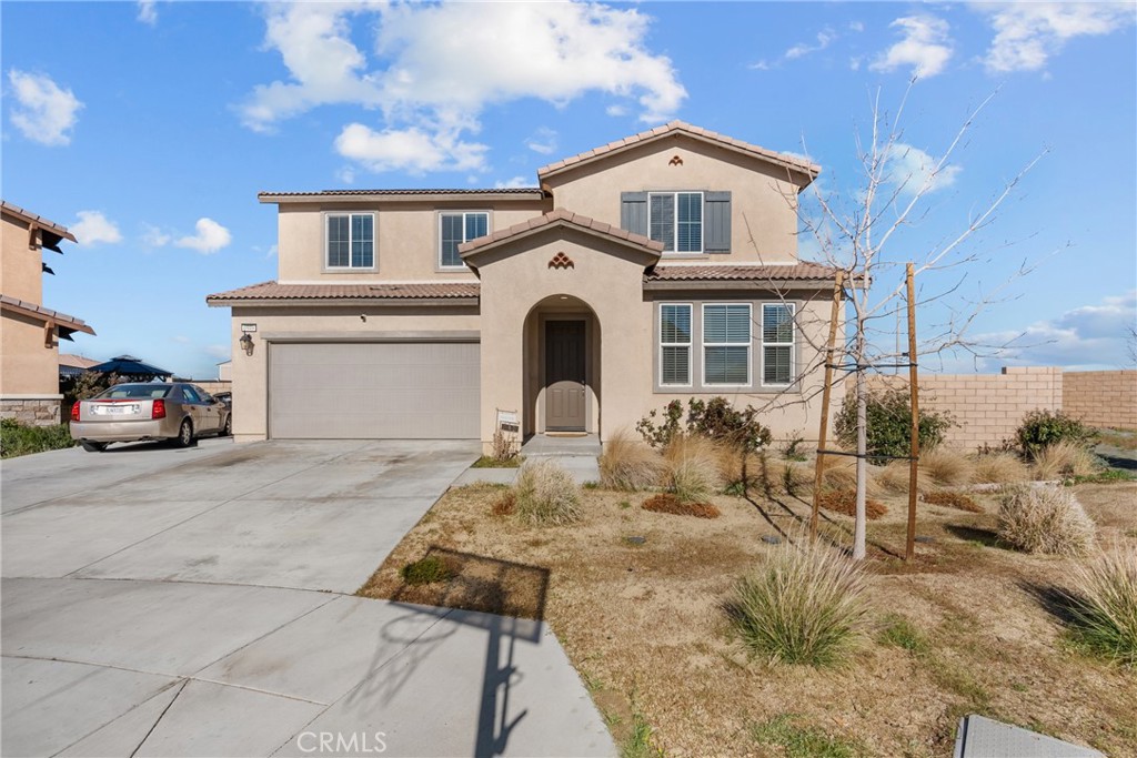 6949 Beale Road Palmdale, CA 93552 - Photo 2 of 32 a front view of a house with a yard