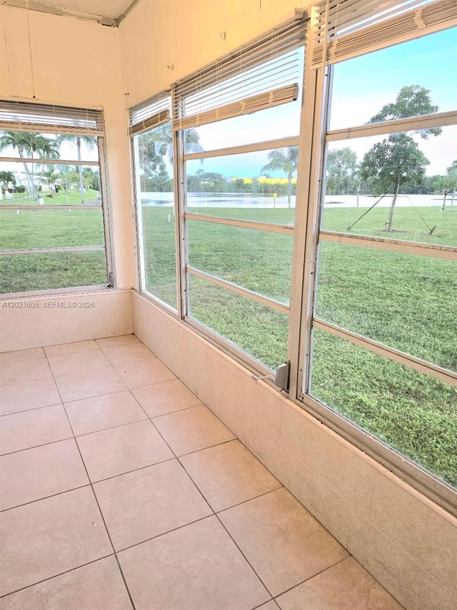 2309 Park Lane, Unit 116 Hollywood, FL 33021 - Photo 1 of 16 Porch with lake view