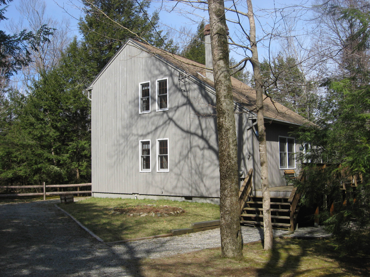 219 Slope Road Tolland, MA 01034 - Photo 1 of 21 a view of a white house with a yard