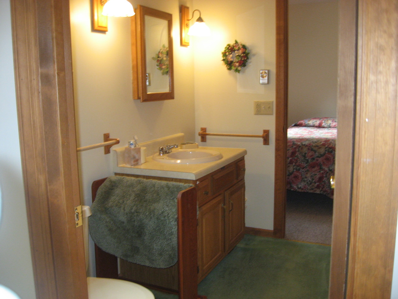 219 Slope Road Tolland, MA 01034 - Photo 18 of 21 a en suite bathroom with a sink and mirror