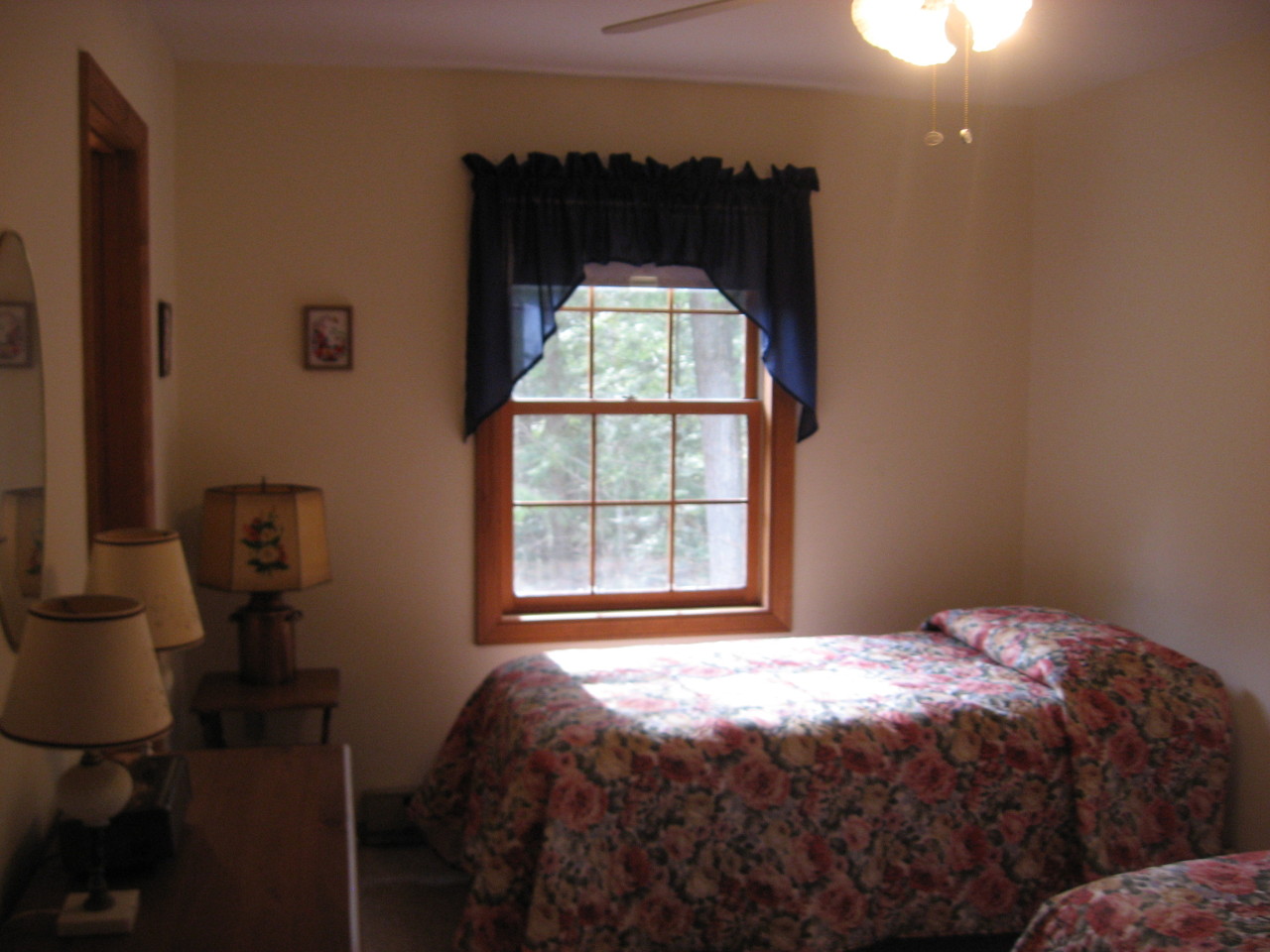 219 Slope Road Tolland, MA 01034 - Photo 19 of 21 a bedroom with a bed and a window
