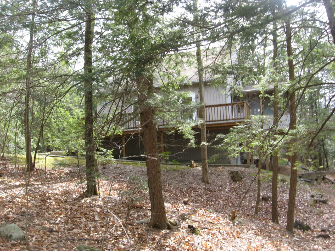 219 Slope Road Tolland, MA 01034 - Photo 6 of 21 a view of a house with a yard