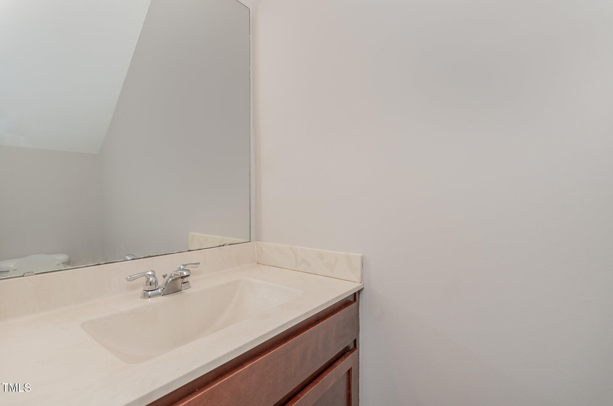 3529 Eastern Branch Road Raleigh, NC 27610 - Photo 12 of 29 a bathroom with a sink and a mirror