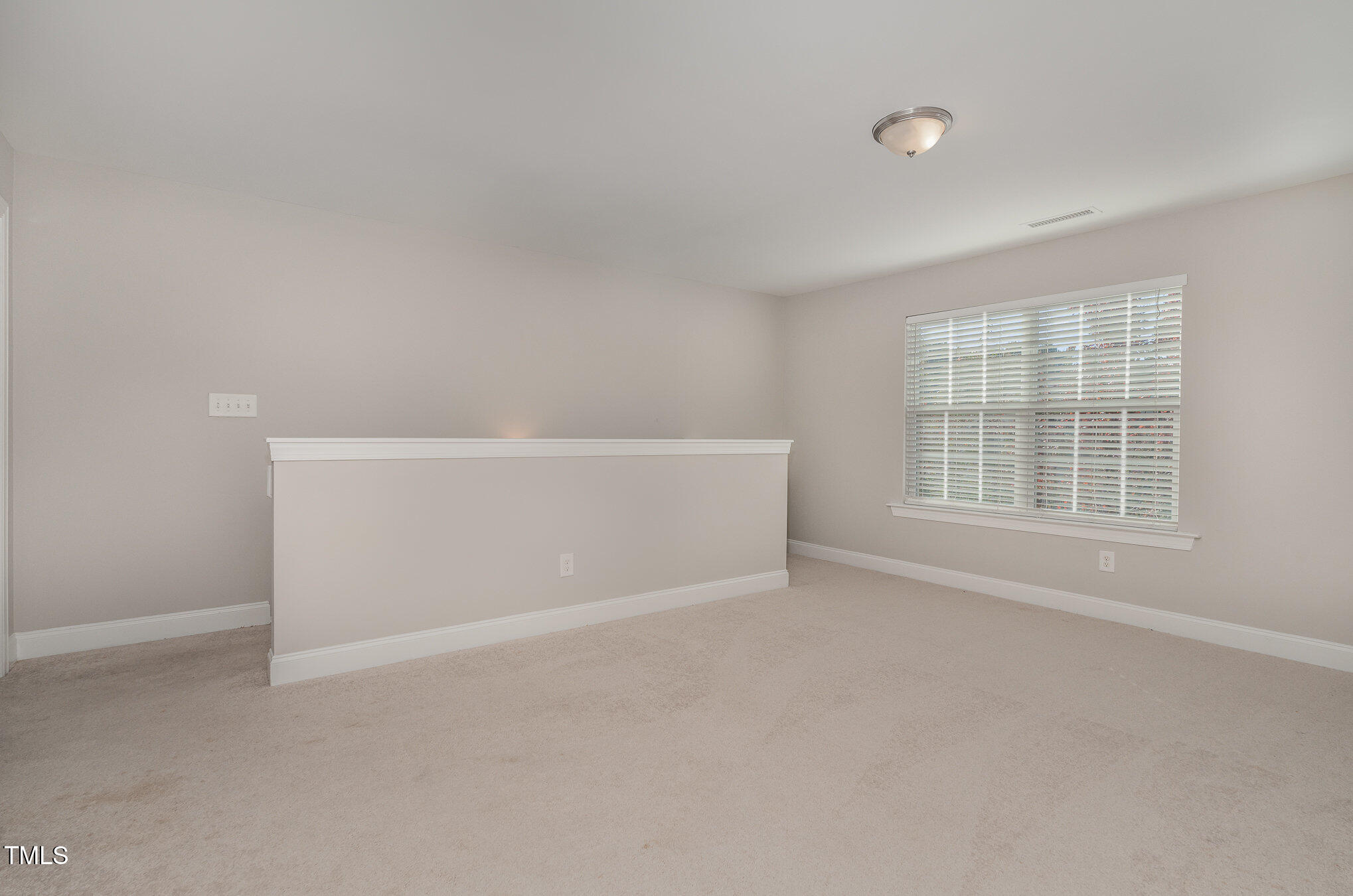 3529 Eastern Branch Road Raleigh, NC 27610 - Photo 15 of 29 an empty room with windows