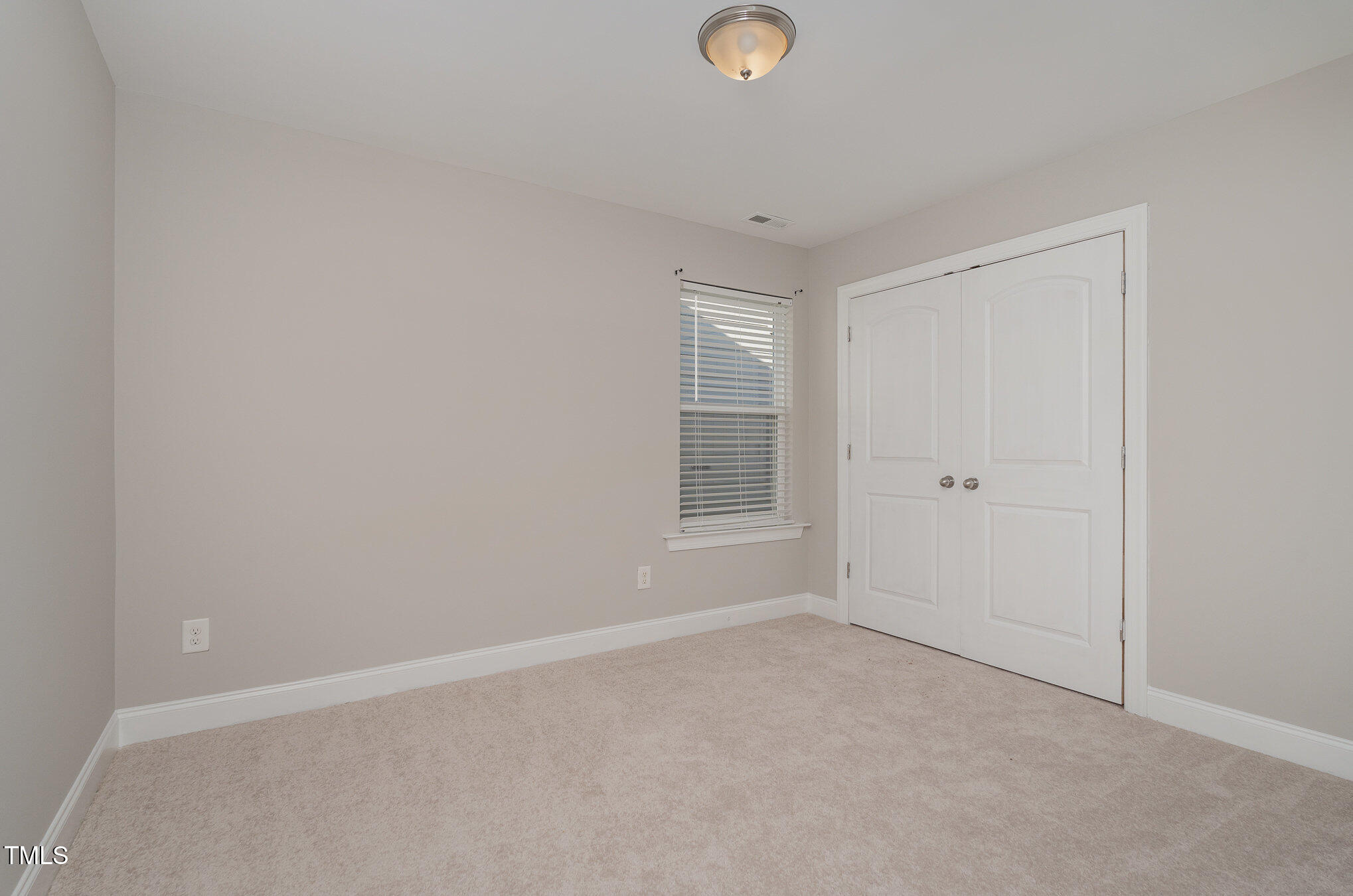 3529 Eastern Branch Road Raleigh, NC 27610 - Photo 23 of 29 an empty room with windows