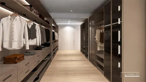 a bathroom with a shower and a mirror