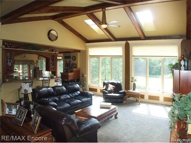 8629 Sashabaw Road Clarkston, MI 48348 - Photo 8 of 34 Exposed beams in great room with spectacular private views