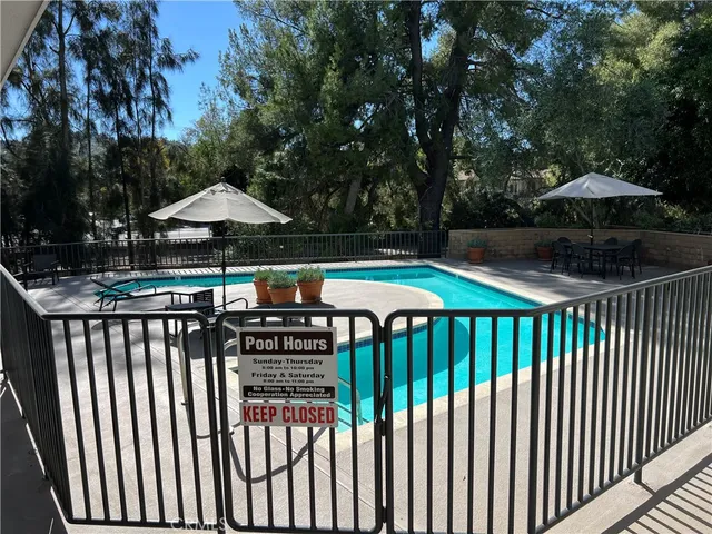 a view of street from balcony