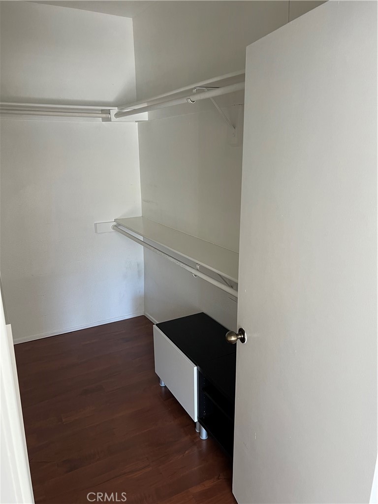 13331 Moorpark Street, Unit 110 Sherman Oaks, CA 91423 - Photo 27 of 32 a view of walk in closet with empty racks