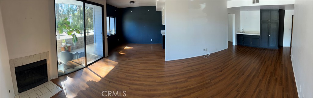 13331 Moorpark Street, Unit 110 Sherman Oaks, CA 91423 - Photo 6 of 32 a view of entryway with wooden floor