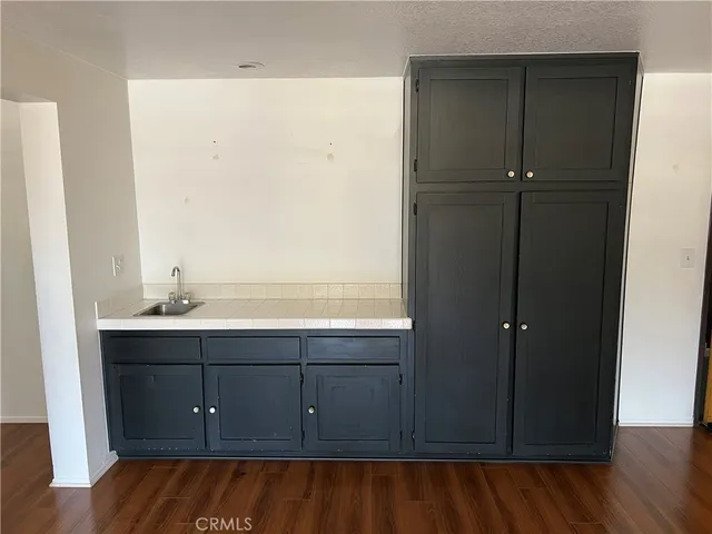 a bathroom with a sink and mirror