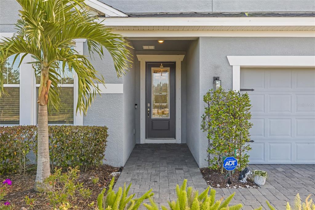 12556 Ryegrass Loop Parrish, FL 34219 - Photo 6 of 49 a view of a entryway door of the house