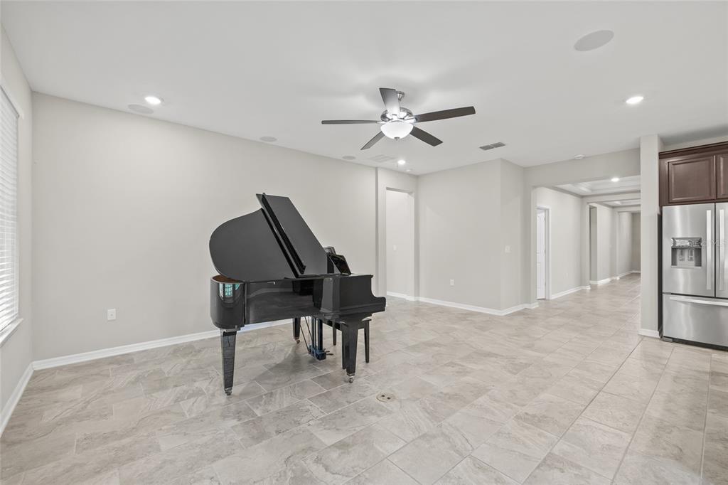 12556 Ryegrass Loop Parrish, FL 34219 - Photo 9 of 49 a view of a workspace with furniture
