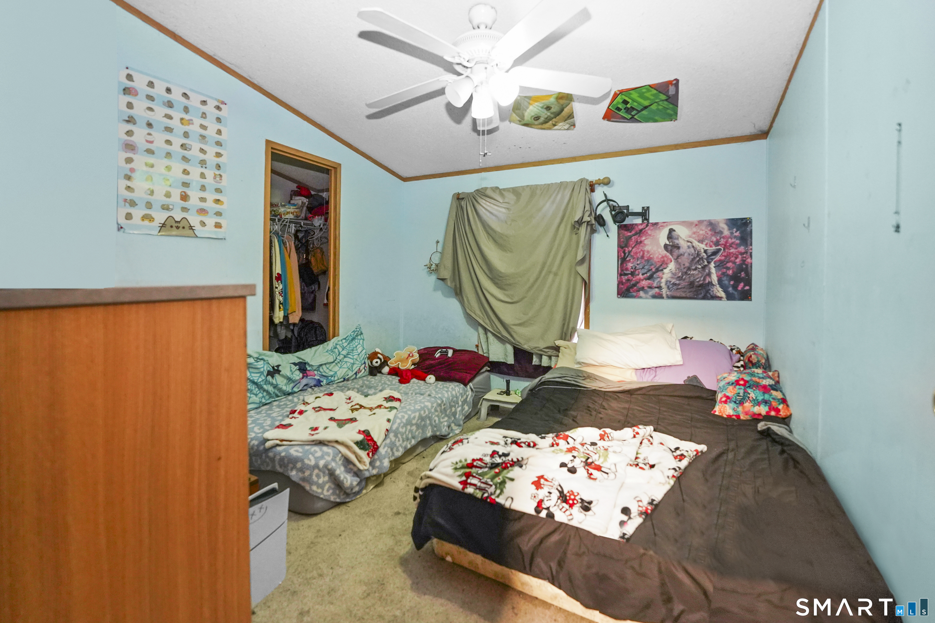 7 Jessie Lane Windham, CT 06256 - Photo 14 of 34 a bedroom with furniture and a bed