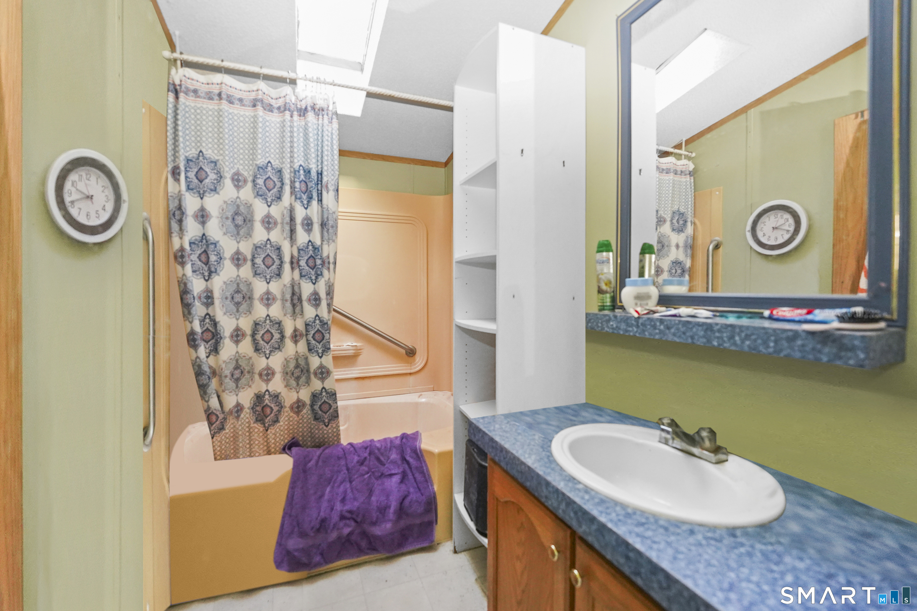 7 Jessie Lane Windham, CT 06256 - Photo 17 of 34 a bathroom with a granite countertop sink and a mirror