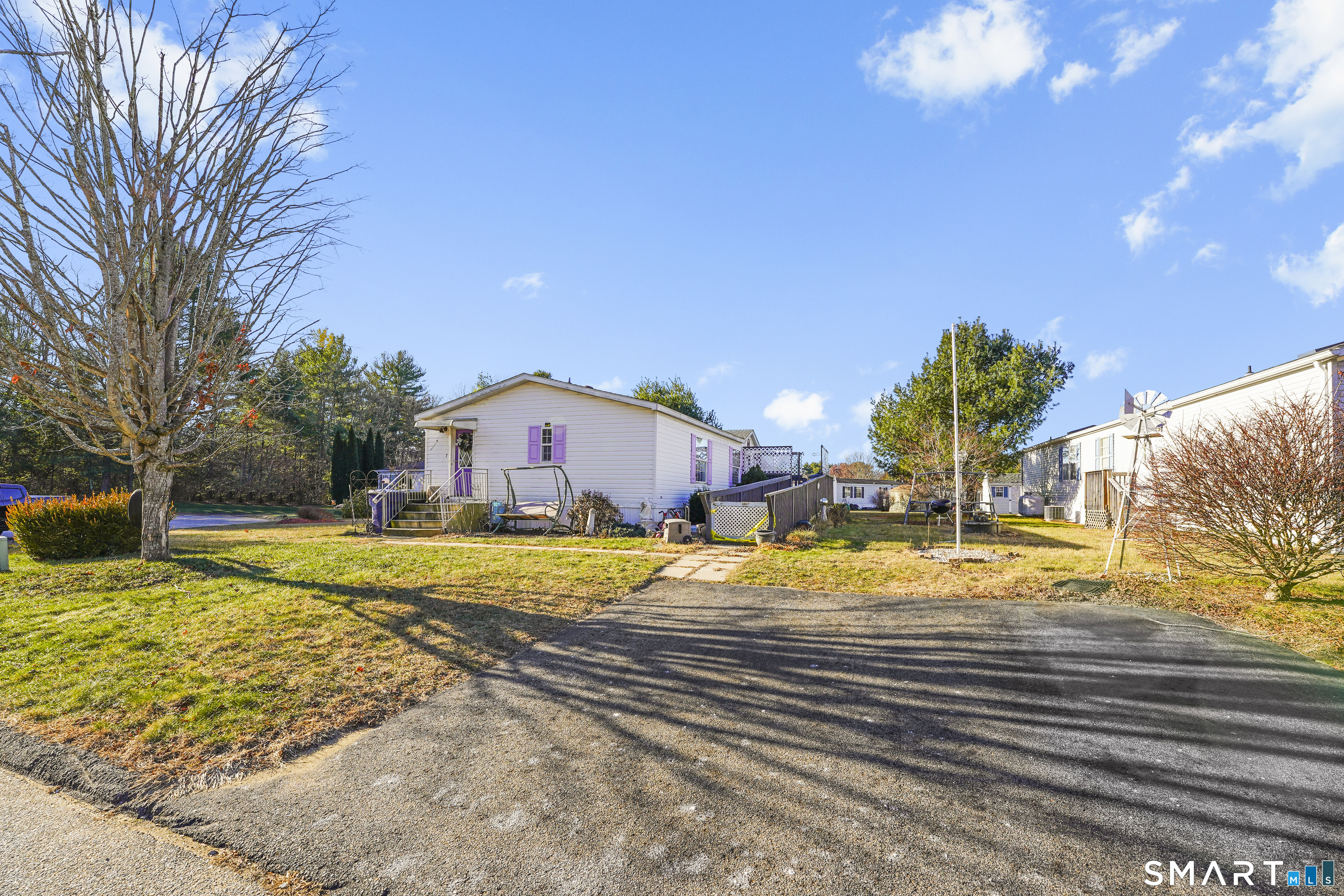 7 Jessie Lane Windham, CT 06256 - Photo 27 of 34 a view of a house with snow on the side of the road