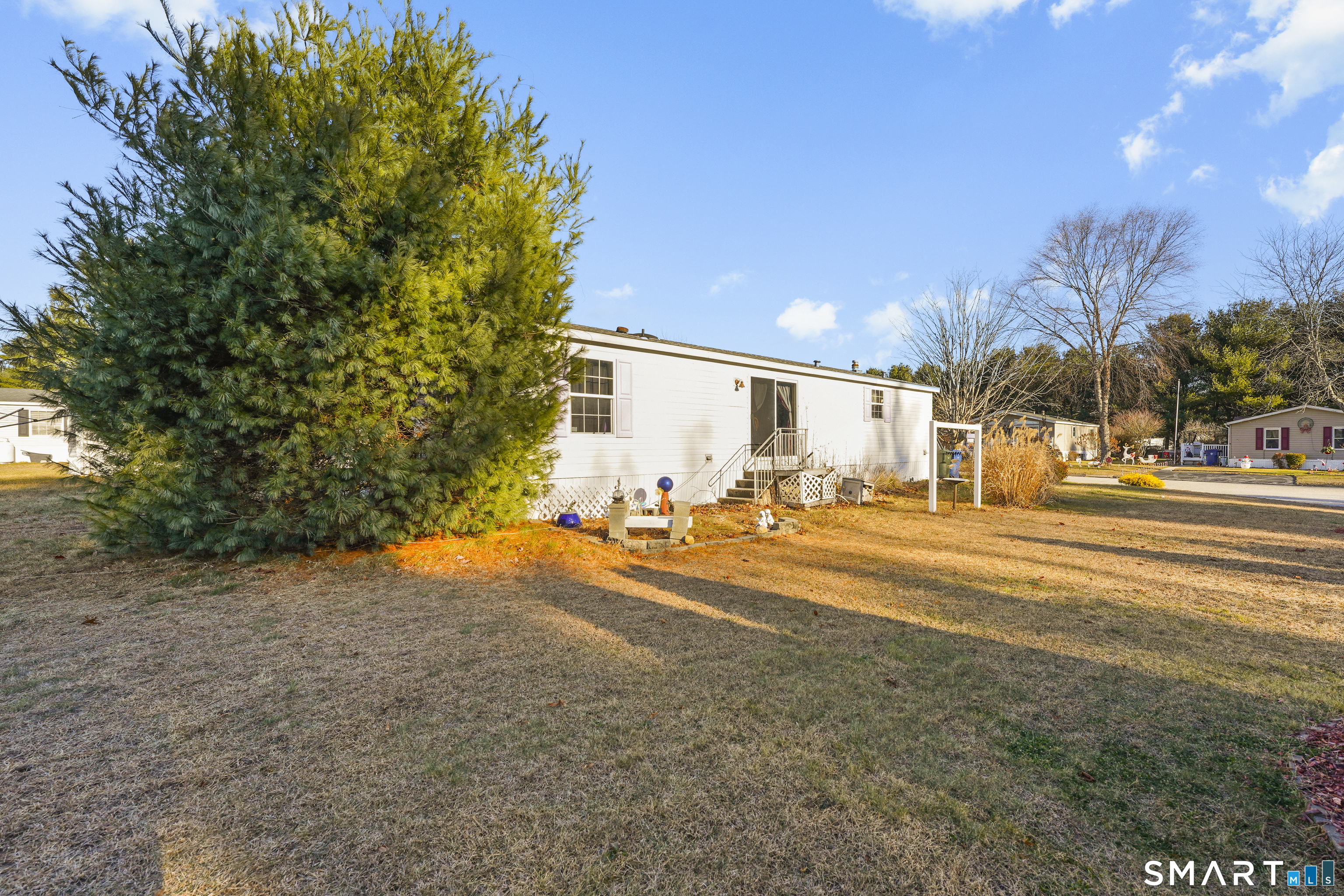 7 Jessie Lane Windham, CT 06256 - Photo 32 of 34 a view of a yard with tree s