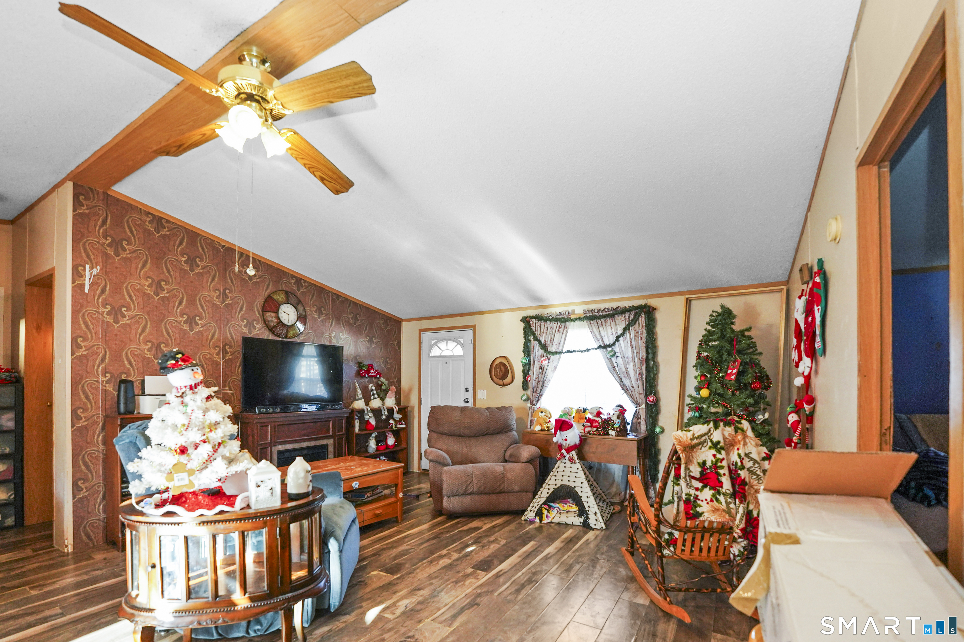 7 Jessie Lane Windham, CT 06256 - Photo 8 of 34 a living room with furniture and a flat screen tv