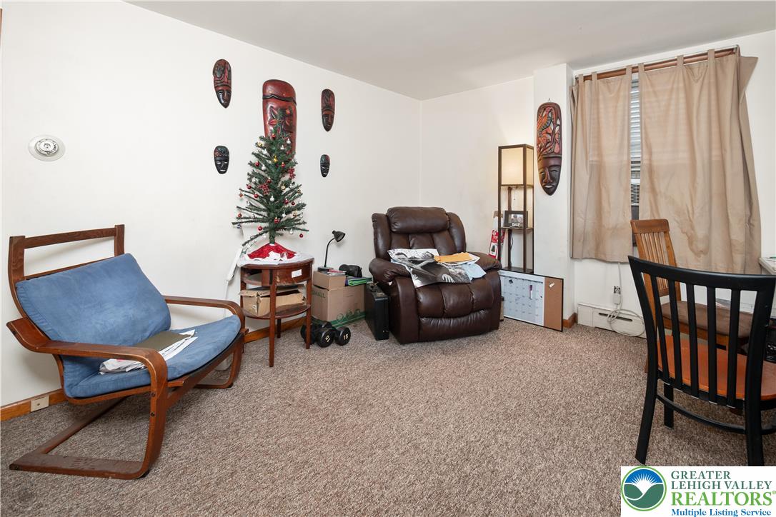 2401 Birch Street Wilson, PA 18042 - Photo 12 of 37 a living room with furniture and a large window