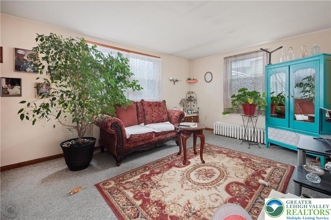 2401 Birch Street Wilson, PA 18042 - Photo 17 of 37 a living room with furniture and a rug