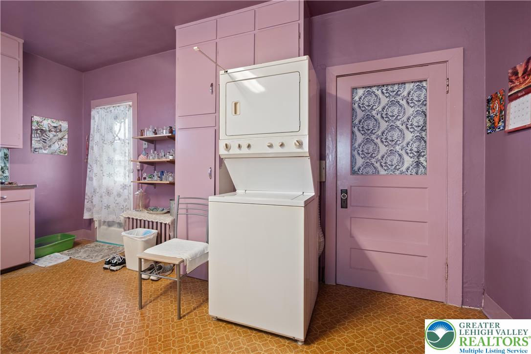 2401 Birch Street Wilson, PA 18042 - Photo 21 of 37 a utility room with cabinets washer and dryer