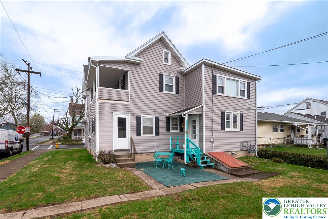 2401 Birch Street Wilson, PA 18042 - Photo 5 of 37 a front view of a house with a yard