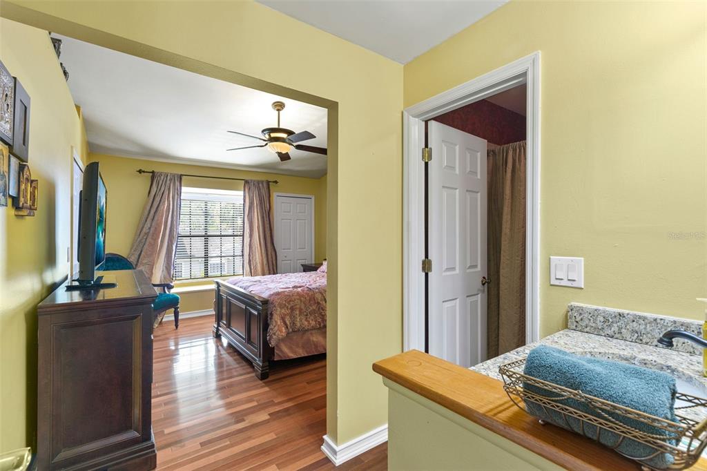 5100 Burchette Road, Unit 2701 Tampa, FL 33647 - Photo 16 of 38 a living room with furniture and wooden floor