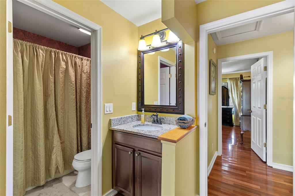 5100 Burchette Road, Unit 2701 Tampa, FL 33647 - Photo 17 of 38 a bathroom with a double vanity sink and a mirror