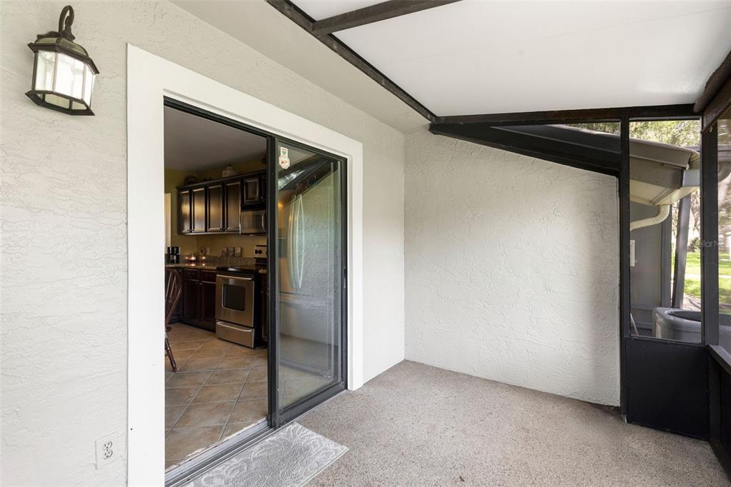 5100 Burchette Road, Unit 2701 Tampa, FL 33647 - Photo 30 of 38 a view of a hallway and a livingroom with furniture
