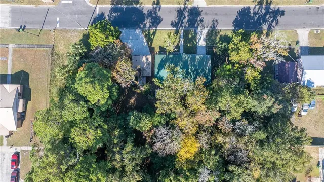 an aerial view of multiple house with outdoor space