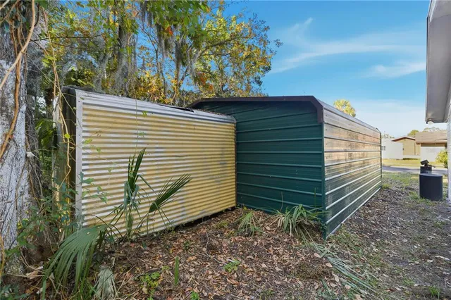 a view of a back yard of the house