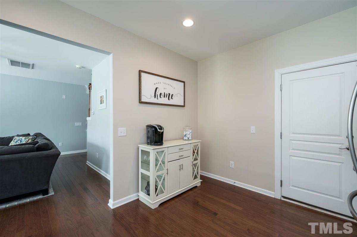 8705 Wild Magnolia Drive Raleigh, NC 27617 - Photo 9 of 15 a view of a workspace with wooden floor